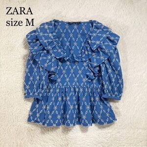 ZARA Blue Ruffle Peplum Blouse with White Embroidered Pattern